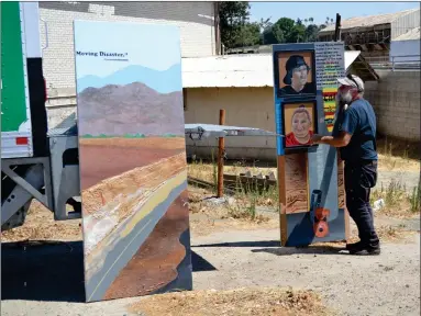  ?? RECORDER PHOTOS BY ALEXIS ESPINOZA ?? Marc Patterson, from Mclane High School, delivered 31 panels depicting the drought and its effects on the residents of Portervill­e to the Portervill­e Area Coordinati­ng Council on Friday morning.