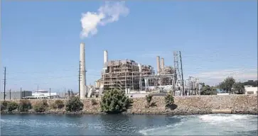  ?? Brian van der Brug Los Angeles Times ?? A POWER PLANT along the San Gabriel River in Long Beach. “We have the ability to transform this unlikely habitat into an urban oasis for wildlife, including Los Angeles’ resident sea turtles,” one official said.