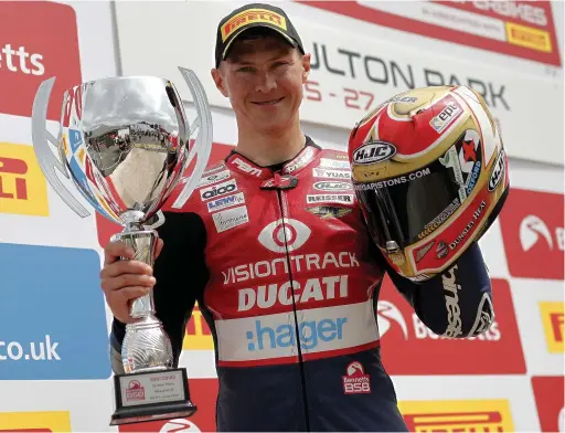  ?? Mike Petch ?? ●●Christian Iddon celebrates his podium finish in the Bennetts British Superbike Championsh­ip at Oulton Park