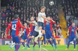  ?? AFP ?? Tottenham Hotspur defender Eric Dier (centre) heads the ball from across but misses the goal during the Premier League match against Crystal Palace at Selhurst Park in south London on Wednesday.