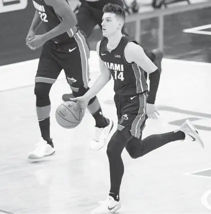  ?? NICK WASS /AP ?? Heat guard Tyler Herro dribbles the ball during the second half against the Washington Wizards last Saturday.