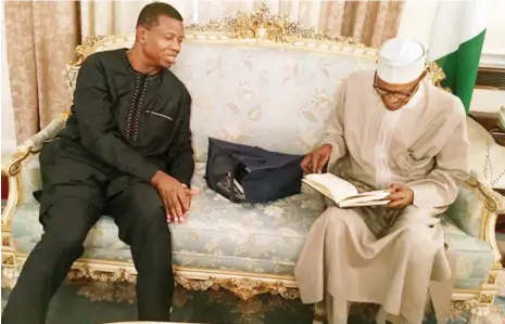  ?? President Muhammadu Buhari with the General Overseer Worldwide Redeemed Christian Church of God, Pastor Enoch Adejare Adeboye at the Abuja House in London yesterday State House ??