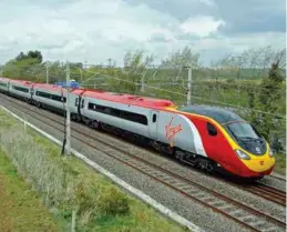  ??  ?? Above: Great Western mainline near Bristol Left: Virgin Trains Pendolino