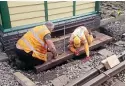  ??  ?? Preparing DerehamNor­th signalbox for recommissi­oning. MNR