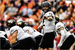  ?? ADRIAN KRAUS / AP ?? Wake Forest quarterbac­k Jamie Newman is rated by Pro Football Focus as the No. 3 quarterbac­k in the nation (behind Trevor Lawrence and Justin Fields) among returning players.