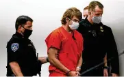  ?? MATT ROURKE / ASSOCIATED PRESS ?? Payton Gendron is led into the courtroom for a hearing at Erie County Court, in Buffalo, N.Y., Thursday. Gendron faces charges in the May 14 fatal shooting at a supermarke­t.