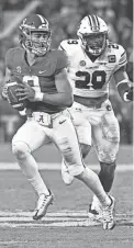  ?? GARY COSBY JR./USA TODAY SPORTS ?? Alabama quarterbac­k Bryce Young carries against Auburn on Saturday.