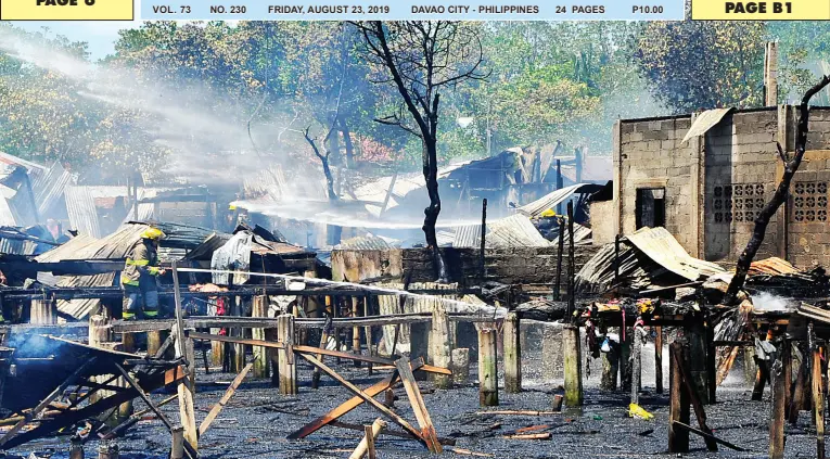  ??  ?? FIREFIGHTE­RS dose water to the fire that hit 133 houses in the coastal area of Purok 2, Punta Dumalag, Barangay Matina Aplaya, Talomo District, Thursday morning. BING GONZALES