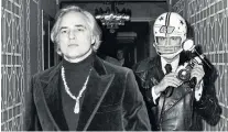  ?? ?? ‘Paparazzi germs’: Brando got a hand infection after punching Galella, who sued him for $40,000 and wore a helmet for their next encounter, pictured, in 1974