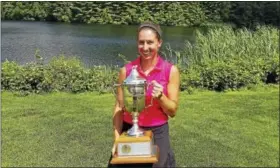  ?? JOE MORELLI - HEARST CONNECTICU­T MEDIA ?? Autumn Serruta holds the trophy after winning the 52nd Connecticu­t Women’s Amateur championsh­ip Wednesday.