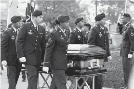  ?? JERRY JACKSON/BALTIMORE SUN ?? A casket carrying U.S. Rep. Elijah Cummings arrives Wednesday at Morgan State University in Baltimore for the start of three days of public viewings and commemorat­ions leading up to his funeral. The casket was escorted by Morgan State ROTC students.