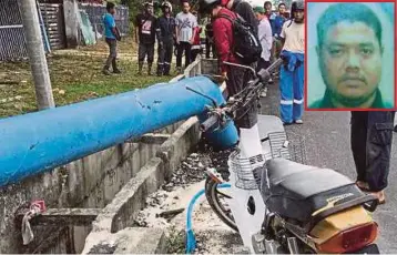  ??  ?? KEADAAN motosikal mangsa yang terbabas di Jalan Kuala Terengganu-Kuantan, dekat Kemasik, semalam. Gambar kecil, Mohd Firdaus.