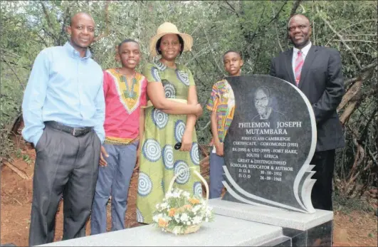  ??  ?? INSPIRED: Professor Arthur Mutambara, far right, at his father’s tombstone unveiling ceremony.