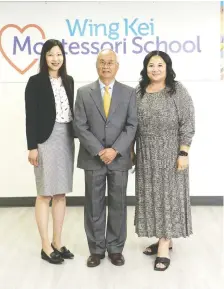  ??  ?? Wing Kei board secretary Alena Tse, board chair Vincent Leung, and board treasurer Sandy Jung show off the new Wing Kei Montessori School.