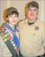  ?? SUBMITTED ?? Trey Moody, left, is pictured with his father, Lackey Moody. Trey received his Eagle Scout rank in December, two days before his 14th birthday, which was Dec. 19. Moody’s project was building a flag-retirement pit in Riverside Park in Batesville.