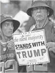  ?? THOMAS J. RUSSO, USA TODAY SPORTS ?? Cleveland Browns fans hold a sign in support of President Trump during their game against the Indianapol­is Colts at Lucas Oil Stadium.