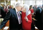  ?? ARNOLD GOLD — NEW HAVEN REGISTER ?? Daniel and Mariette Hogan kiss after renewing their vows during Mass at The Church of Assumption in Ansonia as World Marriage Day coincided with Valentine’s Day on Feb. 14, 2016.