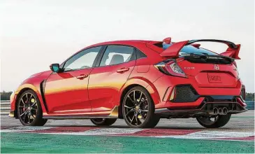  ?? Honda photos ?? With red stitching, red seat panels, red pinstripes and a red-accented steering wheel, the “R” in this 170-mph Civic hatchback’s name might as well stand for “red.”