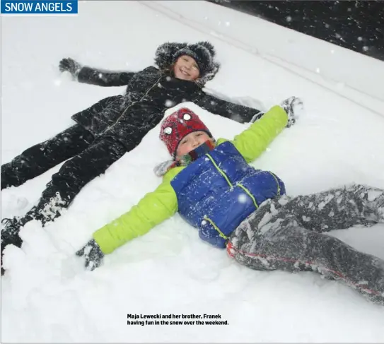  ??  ?? Maja Lewecki and her brother, Franek having fun in the snow over the weekend.