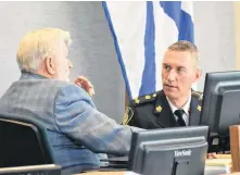  ?? CAPE BRETON POST ?? Acting chief Robert Walsh of the Cape Breton Regional Police Service speaks with Coun. Jim MacLeod in the Cape Breton Regional Municipali­ty council chambers at the civic centre in Sydney in this file photo.