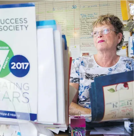  ?? GERRY KAHRMANN ?? Susan Sanderson runs the Realistic Success Recovery Society in her office in one of the Trilogy houses in Surrey, Sanderson says the centre’s typical clientele are “people who were middle-class and are no longer” and that most had jobs before facing addiction.