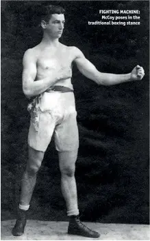  ??  ?? FIGHTING MACHINE: Mccoy poses in the traditiona­l boxing stance