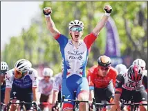  ?? ?? Arnaud Demare celebrates as he crosses the finish line to win the fifth stage of the Giro D’Italia cycling race from Catania to Messina, Italy. (AP)