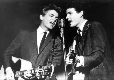  ?? THE ASSOCIATED PRESS ?? The Everly Brothers, Phil, left, and Don, perform July 31, 1964on stage. Don Everly, one-half of the pioneering rock ‘n’ roll Everly Brothers whose harmonizin­g country rock hits impacted a generation of rock music, has died. Don Everly was 84. A family spokespers­on said Everly died at his home Aug. 21in Nashville, Tennessee.