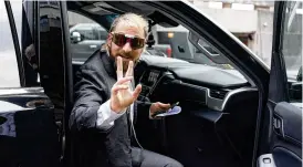  ?? AP ?? Anthime “Baked Alaska” Gionet, who livestream­ed himself storming the U.S. Capitol, leaves the federal courthouse in Washington on Tuesday after being sentenced to 60 days in prison followed by two years of probation for his role in the attack.