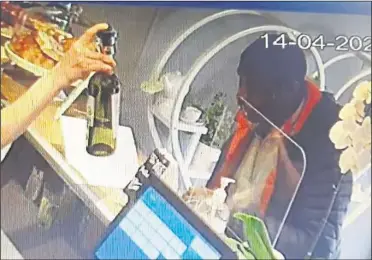  ??  ?? A still from the CCTV footage showing the tip jar theft