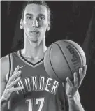  ?? CHRIS LANDSBERGE­R/THE OKLAHOMAN ?? Aleksej Pokusevski averaged 7.6 points and 5.2 rebounds per game this season for the Thunder.