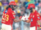  ?? AFP ?? KXIP openers KL Rahul (right) and Chris Gayle.