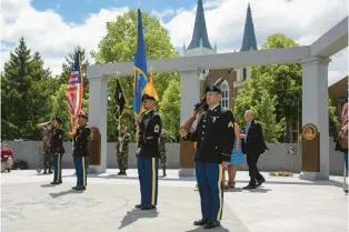  ?? COURANT FILE PHOTO ?? The Connecticu­t Army National Guard’s Color Guard stands at attention inside the Connecticu­t State Veterans Memorial in Hartford on Memorial Day in 2019. Recent acts of vandalism on veterans memorials around the nation, including one in Wallingfor­d, are difficult to comprehend.