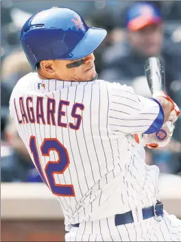  ?? Paul J. Bereswill ?? JUAN THE RIGHT TRACK: Juan Lagares, after a shaky spring training, is 5-for-9 to start the season. That included three hits Sunday in the Mets’ 5-1 loss to the Cardinals at Citi Field.