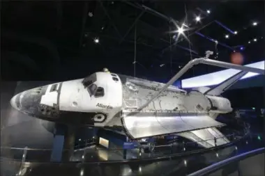  ?? JOHN RAOUX — THE ASSOCIATED PRESS ?? This file photo shows the space shuttle Atlantis on display at the Kennedy Space Center Visitor Complex in Cape Canaveral, Fla. Five years after Atlantis completed the space shuttle program’s final voyage, NASA is still at least a year away from...