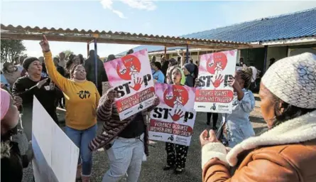  ?? /WERNER HILLS ?? Parents protest at Machiu Primary School in the Eastern Cape after claims that a six-year-old girl was raped there, in contrast to parents at JE Ndlovu High School in KwaZulu-Natal who led a protest in favour of a teacher accused of having relationsh­ips with his pupils.