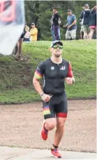  ??  ?? Scenes from the 2019 Memphis in May triathlon at Edmund Orgill Park in Millington on Sunday. BRAD VEST/THE COMMERCIAL APPEAL