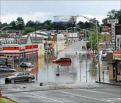  ?? SUBMITTED PHOTO ?? Marshall Road in Upper Darby was under water after heavy rains pounded the region Monday morning.