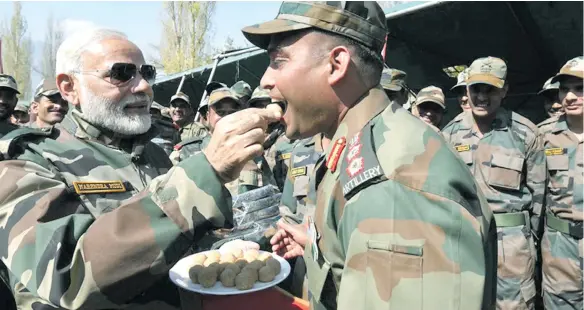  ??  ?? Indian Prime Minister Narendra Modi at the Gurez Valley along the Line of Control (LoC) in Jammu and Kashmir celebrate Diwali with the troops.
