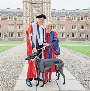  ??  ?? Dobson with his wife and their dog Jimbo, a retired greyhound who was adopted by St John’s College, and right, at a graduate open day; he published more than 800 papers and review articles