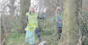  ??  ?? ●● Sutton Parish Council and the Three Villages Community Action Group worked together for the tidy up