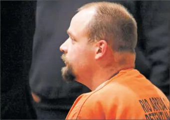  ??  ?? Dustin Bingham sits Thursday in District Court. A state District Court judge on Friday ordered the former Santa Fe County sheriff’s deputy held in jail without bond.