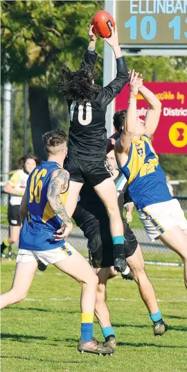  ??  ?? Yarragon’s Darcy Jones flies for a mark in the third quarter in perfect sunshine at Yarragon on Saturday.