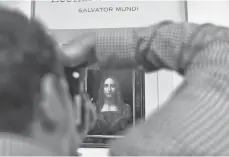  ?? JEWEL SAMAD, AFP/GETTY IMAGES ?? Leonardo da Vinci’s Salvator Mundi is unveiled at Christie’s in New York on Oct. 10. It’s the only one of 20 paintings by da Vinci in private hands.
