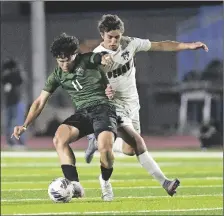  ?? FILE PHOTO BY randy HOEFT/YUMA SUN ?? SAN LUIS HIGH SCHOOL’S LUIS MENESES (11) battles Gilbertper­ry High School’s Talon Moody for control of the ball during the second half of Saturday night’s Arizona Interschol­astic Associatio­n 6A State Championsh­ip game in Mesa.