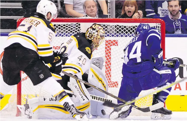  ?? — THE CANADIAN PRESS ?? Toronto Maple Leafs defenceman Morgan Rielly scored on Boston Bruins goalie Tuukka Rask in the first period of Toronto’s 4-2 win on home ice Monday.