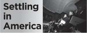  ??  ?? These immigrants became citizens during a naturaliza­tion ceremony at the National Archives in Washington, D.C., in 2015.