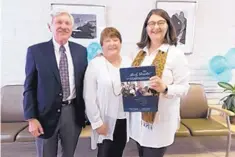  ??  ?? Jim and Ellen King, left, meet with Martha Cole McGrew, M.D., executive vice dean of the UNM School of Medicine, to discuss the Kings’ $500,000 donation for skin cancer.