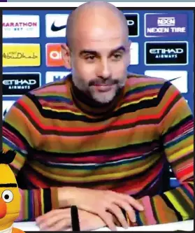  ?? REX ?? Striking: Guardiola in his Bert and Ernie-style jumper HAS PEP JOINED SESAME STREET?