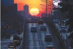  ?? REUTERS ?? A VIEW OF TRAFFIC during sunrise in Bangkok, Thailand, Jan. 5.